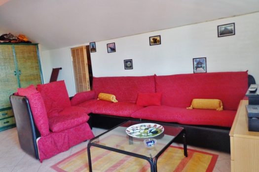 Mansarda arredata con posto auto interno assegnato