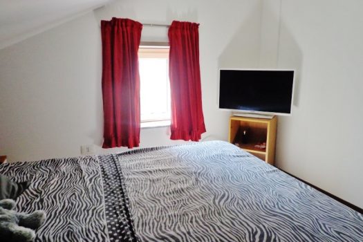 Mansarda arredata con posto auto interno assegnato