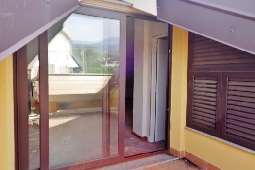 Luminosa mansarda con terrazzo